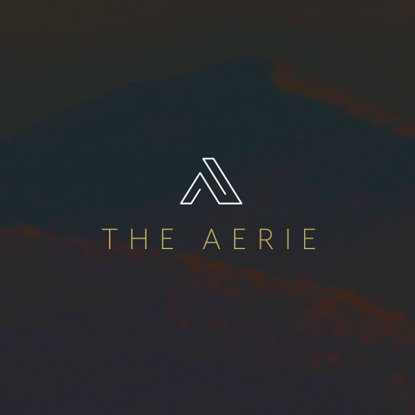 A modern and intellectual logo for a hotel that sits on a vineyard.