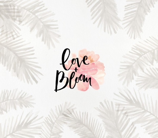 “love and bloom” words against a pink flower, surrounded by gray fan leaves on a white background