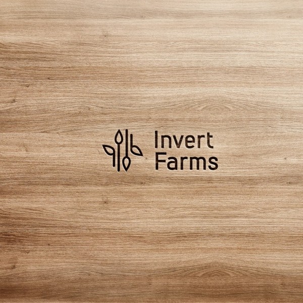 logo with inverted plants